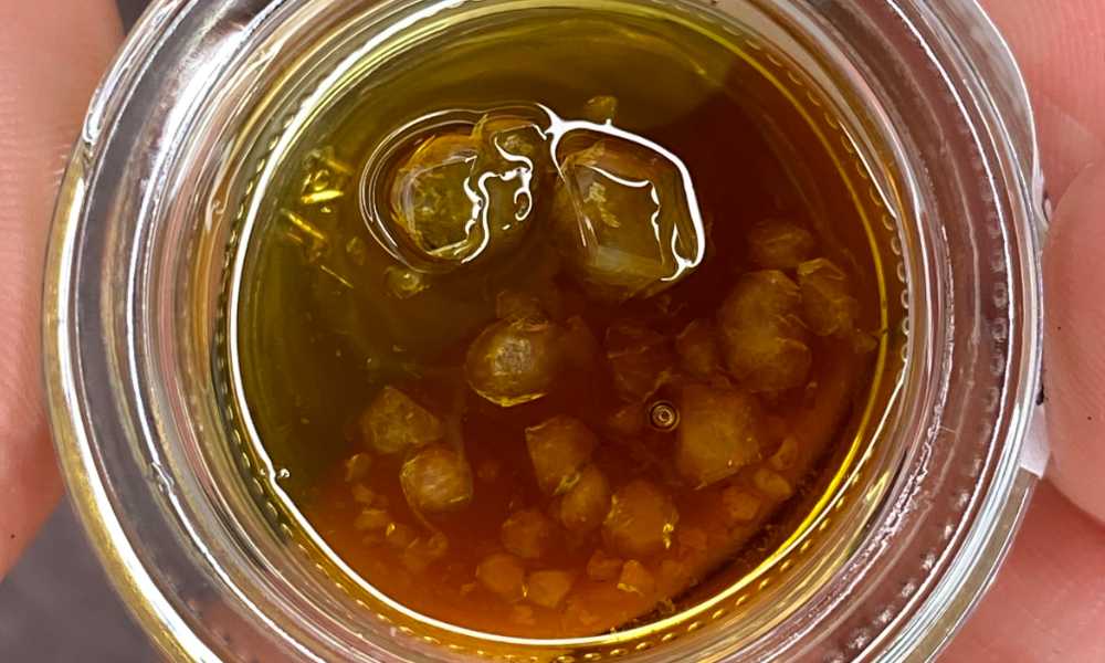 closeup of high terpene extract diamonds in jar