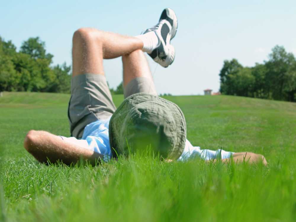 dude in bucket hat chilling on grass